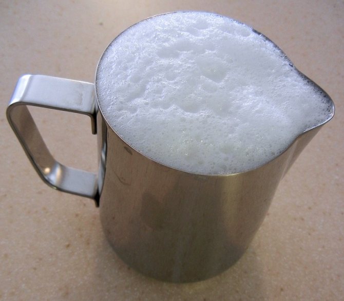 photo of pitcher with whipped milk