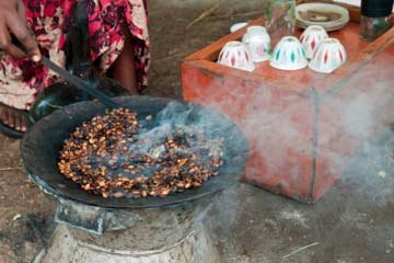 roasting coffee over charcoal in Ethiopia